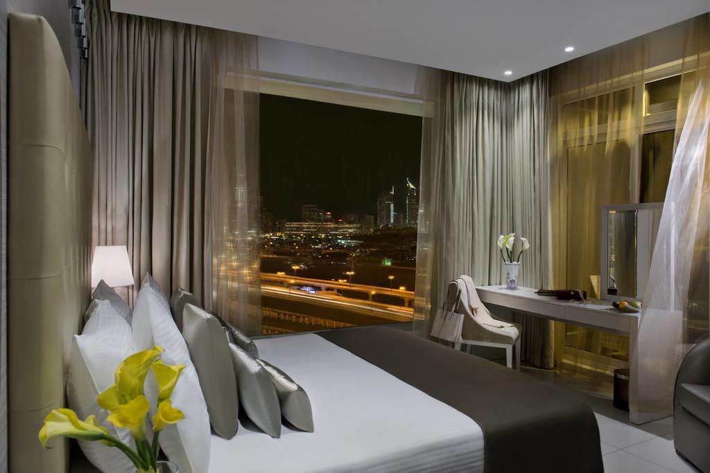 Damac Maison The Vogue Dubai Exterior foto A room at the hotel