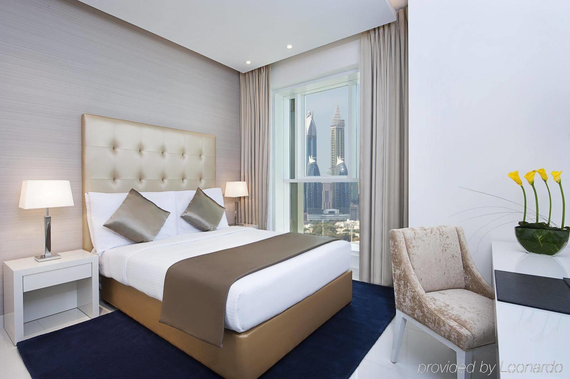 Damac Maison The Vogue Dubai Exterior foto A bedroom at the hotel