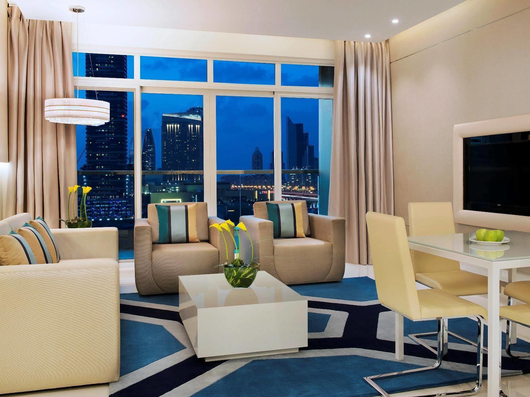 Damac Maison The Vogue Dubai Exterior foto A living room in a typical apartment