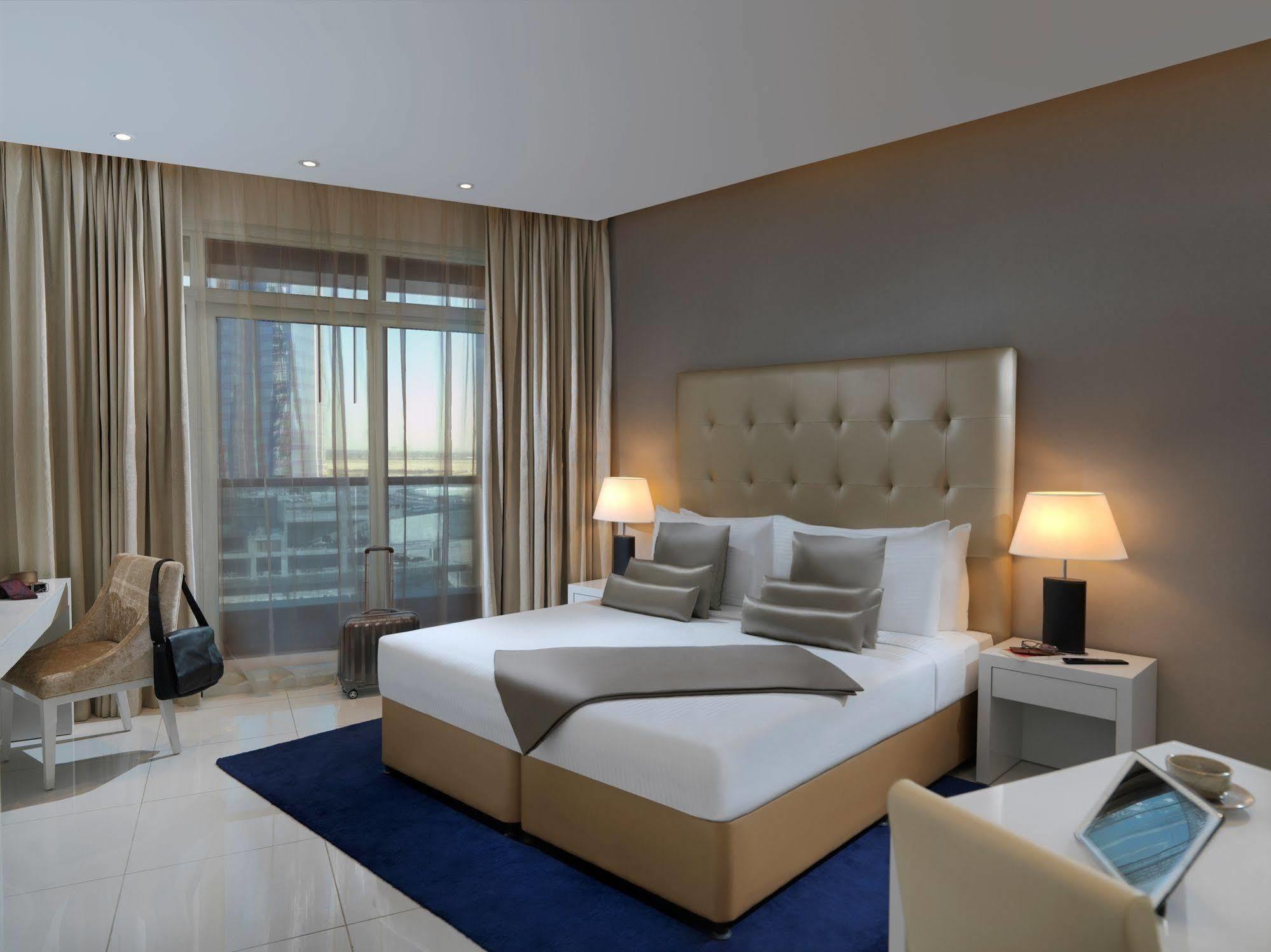 Damac Maison The Vogue Dubai Exterior foto A bedroom at the hotel