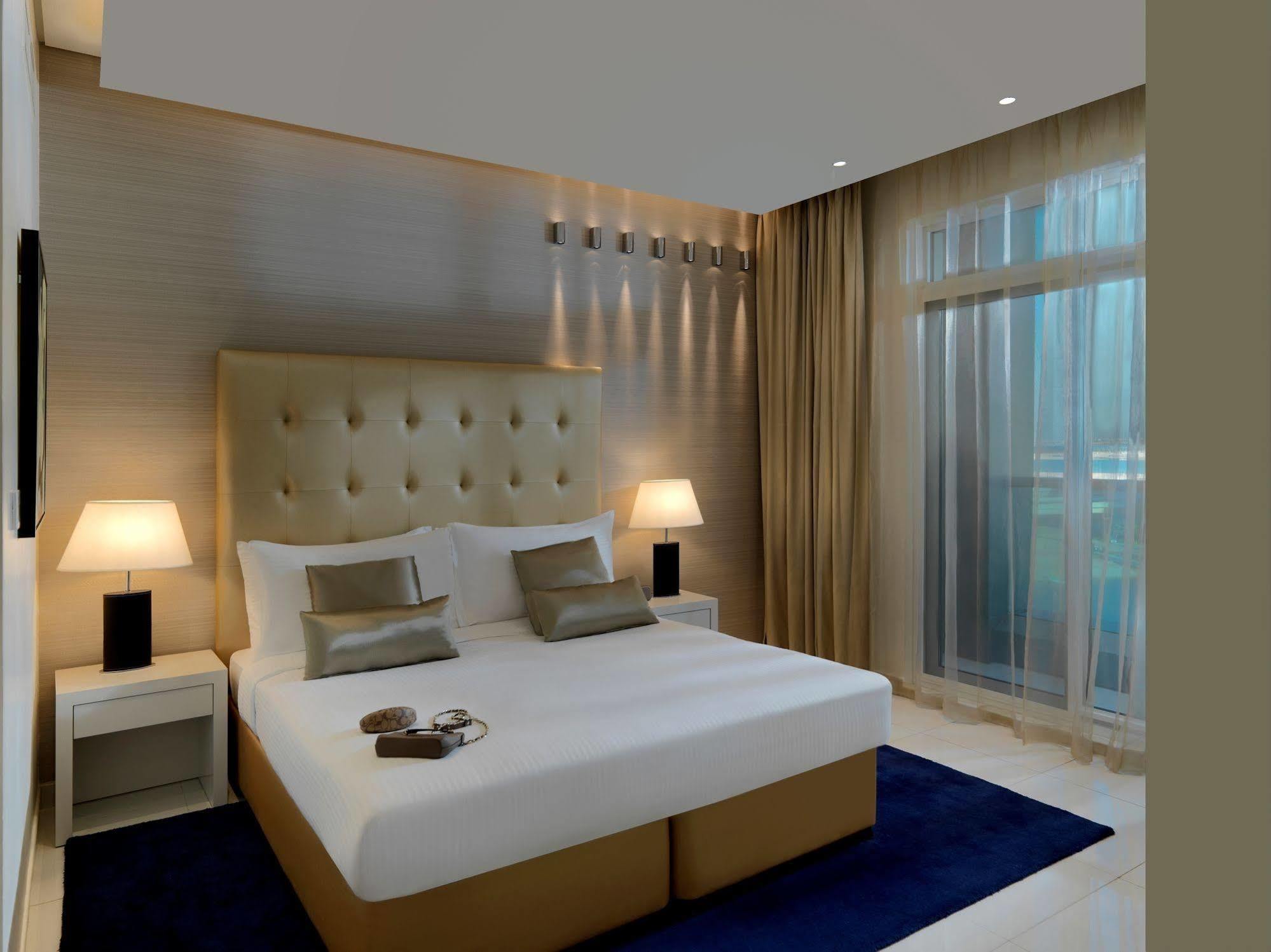 Damac Maison The Vogue Dubai Exterior foto A bedroom at the hotel